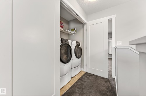 48 Sierra Wynd, Fort Saskatchewan, AB - Indoor Photo Showing Laundry Room