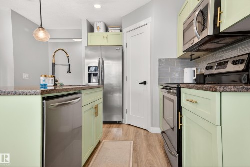 48 Sierra Wynd, Fort Saskatchewan, AB - Indoor Photo Showing Kitchen With Stainless Steel Kitchen With Upgraded Kitchen