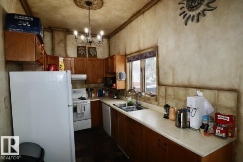 2 8325 Rowland Road, Edmonton, AB - Indoor Photo Showing Kitchen With Double Sink