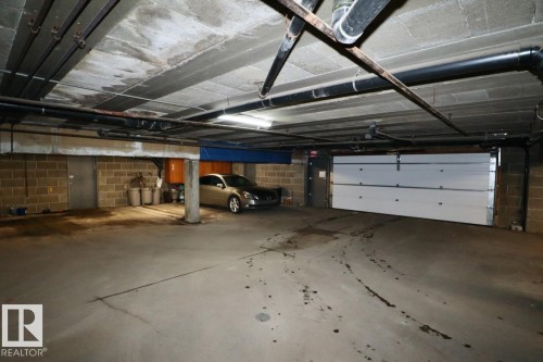 2 8325 Rowland Road, Edmonton, AB - Indoor Photo Showing Garage