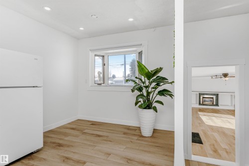 Unfurnished room with light wood-type flooring and recessed lighting - 13520 113A Street, Edmonton, AB - Indoor Photo Showing Other Room
