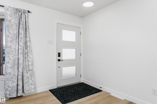 Entryway with light wood finished floors - 13520 113A Street, Edmonton, AB - Indoor Photo Showing Other Room