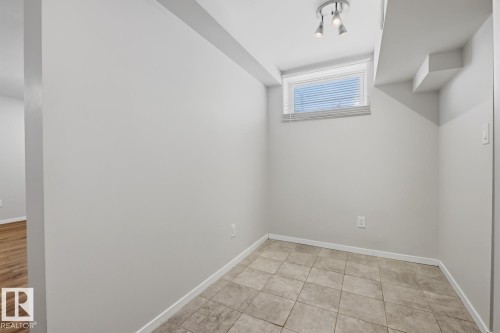 Empty room featuring baseboards - 11332 134 Avenue, Edmonton, AB - Indoor Photo Showing Other Room