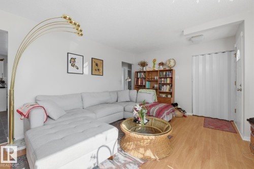 Living room with light wood-style flooring - 11332 134 Avenue, Edmonton, AB - Indoor Photo Showing Living Room