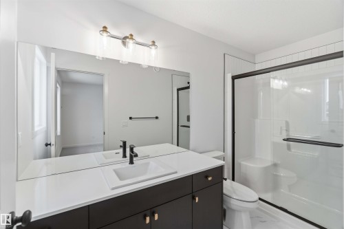 Bathroom with vanity and a stall shower - 8652 Edgemont Link Link, Edmonton, AB - Indoor Photo Showing Bathroom