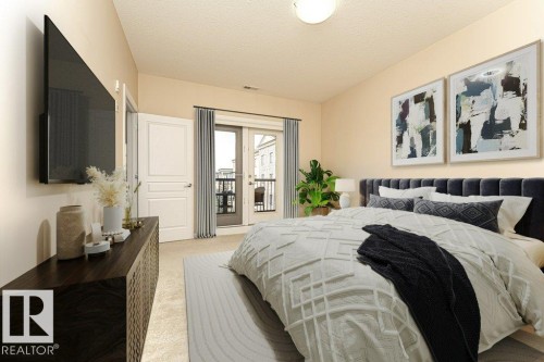302 160 Magrath Road, Edmonton, AB - Indoor Photo Showing Bedroom