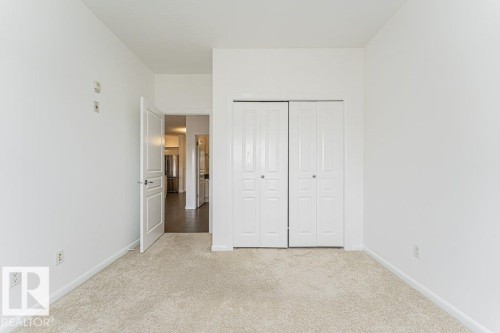 302 160 Magrath Road, Edmonton, AB - Indoor Photo Showing Other Room
