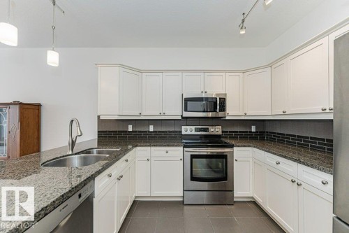 302 160 Magrath Road, Edmonton, AB - Indoor Photo Showing Kitchen With Double Sink