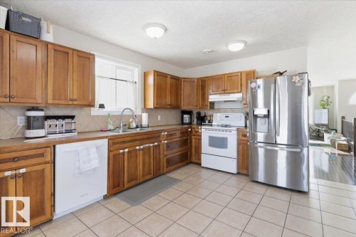 4808 52 Avenue, Thorsby, AB - Indoor Photo Showing Kitchen With Double Sink
