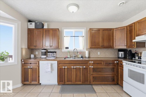 4808 52 Avenue, Thorsby, AB - Indoor Photo Showing Kitchen With Double Sink