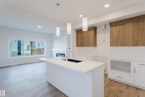 358 Bluff Cove, Leduc, AB - Indoor Photo Showing Kitchen With Double Sink