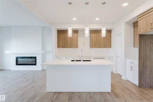 358 Bluff Cove, Leduc, AB - Indoor With Fireplace