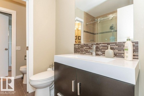 3 pce bath with large shower with tile surround and glass door - 88 Hearthstone Nw, Edmonton, AB - Indoor Photo Showing Bathroom