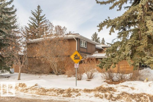 showing road leading to the river valley.  End unit! - 88 Hearthstone Nw, Edmonton, AB - Outdoor