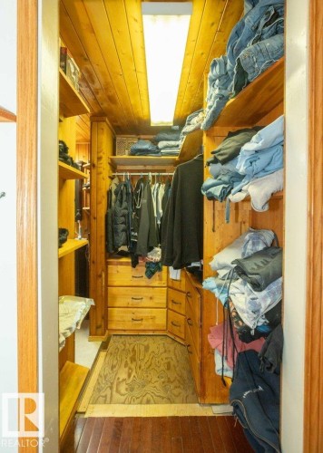 View of walk in closet - 59415A Rg Rd 240, Rural Westlock County, AB - Indoor