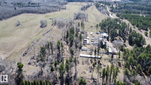 Expansive acreage featuring a mix of cleared land and mature trees - 59415A Rg Rd 240, Rural Westlock County, AB - Outdoor With View