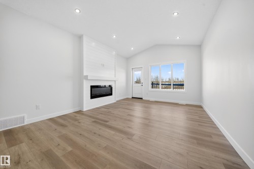 3325 Chickadee Drive, Edmonton, AB - Indoor Photo Showing Living Room With Fireplace