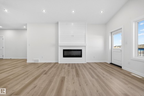 3325 Chickadee Drive, Edmonton, AB - Indoor Photo Showing Living Room With Fireplace