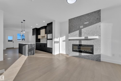 283 Munn Way, Leduc, AB - Indoor Photo Showing Living Room With Fireplace