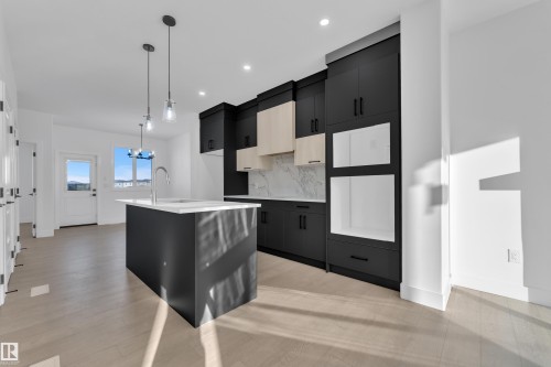 283 Munn Way, Leduc, AB - Indoor Photo Showing Kitchen With Upgraded Kitchen