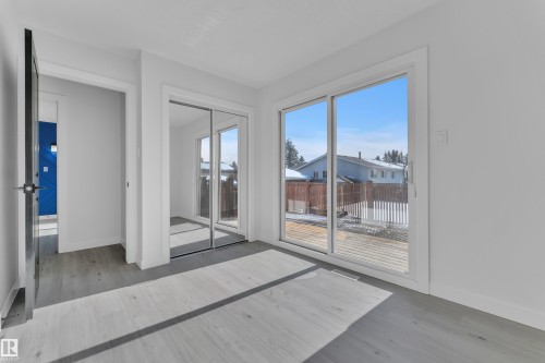 Doorway featuring wood finished floors - 8635 33 Avenue, Edmonton, AB -  With Exterior