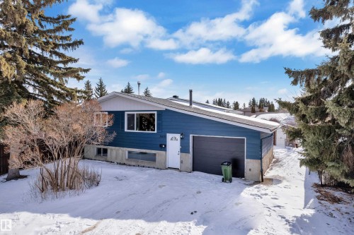 View of front of house with a garage - 8635 33 Avenue, Edmonton, AB - Outdoor