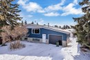 View of front of house with a garage - 8635 33 Avenue, Edmonton, AB  - Outdoor 