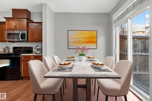 Dining area featuring light wood-style flooring - 11546 11 Avenue, Edmonton, AB - Indoor