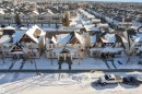 View of snowy aerial view - 6017 213 Street, Edmonton, AB  - Outdoor With Facade 