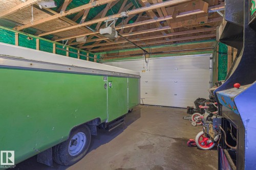 Garage featuring a garage door opener - 21971 91 Avenue Nw, Edmonton, AB - Indoor Photo Showing Garage