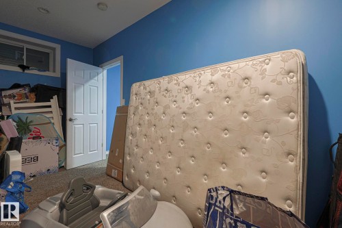 Bedroom with carpet flooring - 21971 91 Avenue Nw, Edmonton, AB - Indoor