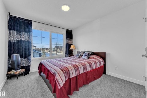 196 Edgewater Circle, Leduc, AB - Indoor Photo Showing Bedroom