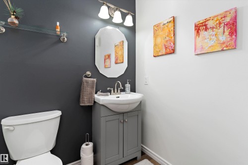 Half bath featuring vanity and toilet - # 3 13450 Fort Road, Edmonton, AB - Indoor Photo Showing Bathroom