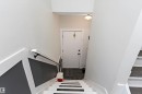 Stairs with baseboards - # 3 13450 Fort Road, Edmonton, AB  - Indoor Photo Showing Other Room 