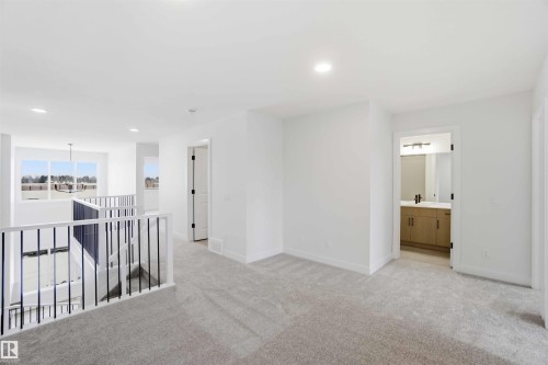 Spare room with recessed lighting and light carpet - 19348 29 Avenue, Edmonton, AB - Indoor Photo Showing Other Room