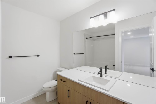 Bathroom with vanity and a shower - 19348 29 Avenue, Edmonton, AB - Indoor Photo Showing Bathroom