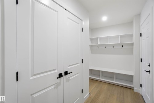 Mudroom with light wood finished floors and recessed lighting - 19348 29 Avenue, Edmonton, AB - Indoor Photo Showing Other Room