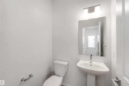 Bathroom with toilet - 18912 28 Avenue, Edmonton, AB - Indoor Photo Showing Bathroom