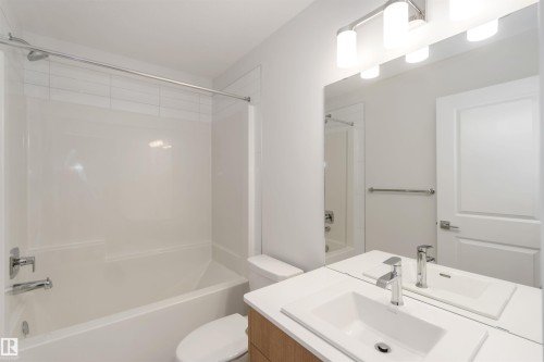 Full bathroom featuring bathtub / shower combination and vanity - 18912 28 Avenue, Edmonton, AB - Indoor Photo Showing Bathroom
