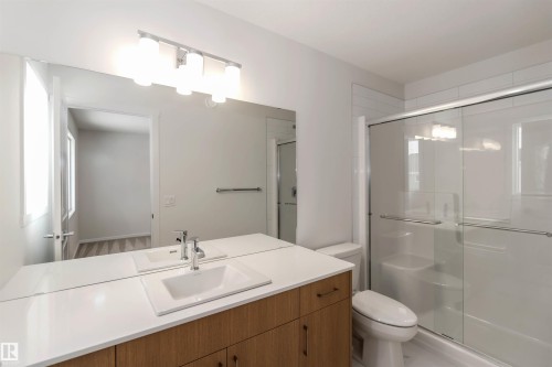 Bathroom with vanity and a shower stall - 18912 28 Avenue, Edmonton, AB - Indoor Photo Showing Bathroom