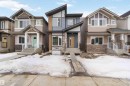 View of front of property featuring stone siding - 18912 28 Avenue, Edmonton, AB  - Outdoor With Facade 