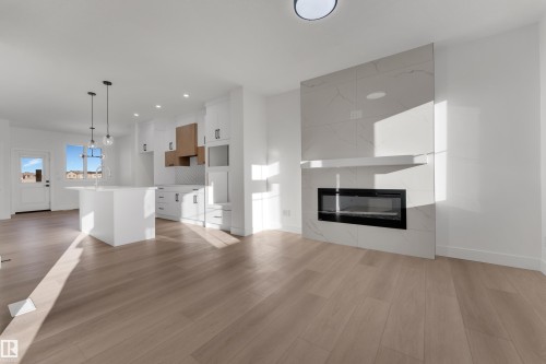 281 Munn Way, Leduc, AB - Indoor Photo Showing Living Room With Fireplace