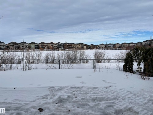 View of yard with a residential view - 6116 53 Avenue, Beaumont, AB - Outdoor