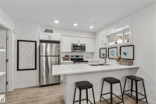 146 Joyal Way, St. Albert, AB - Indoor Photo Showing Kitchen With Stainless Steel Kitchen With Double Sink