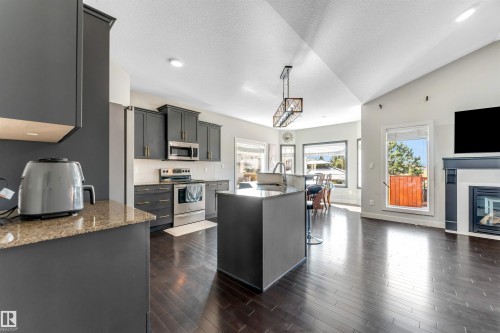 1920 69 St., Edmonton, AB - Indoor Photo Showing Kitchen With Fireplace With Upgraded Kitchen