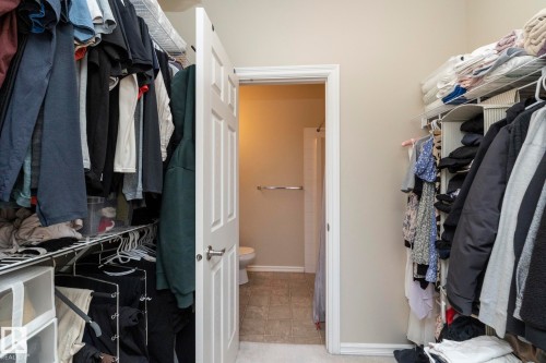 View of walk in closet - 416 263 Macewan Road, Edmonton, AB - Indoor With Storage