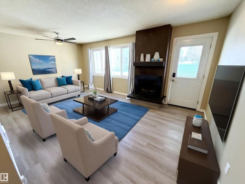 4339 46 Street, Stony Plain, AB - Indoor Photo Showing Living Room With Fireplace