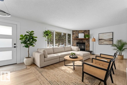 11744 37 Avenue, Edmonton, AB - Indoor Photo Showing Living Room With Fireplace