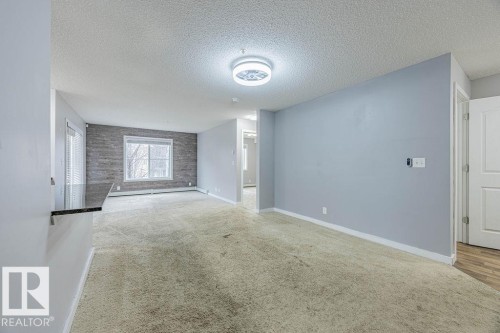 219 530 Watt Boulevard, Edmonton, AB - Indoor Photo Showing Other Room
