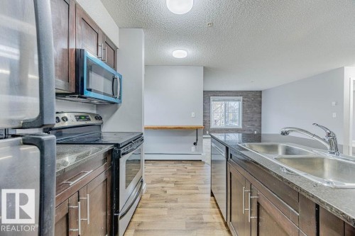 219 530 Watt Boulevard, Edmonton, AB - Indoor Photo Showing Kitchen With Double Sink